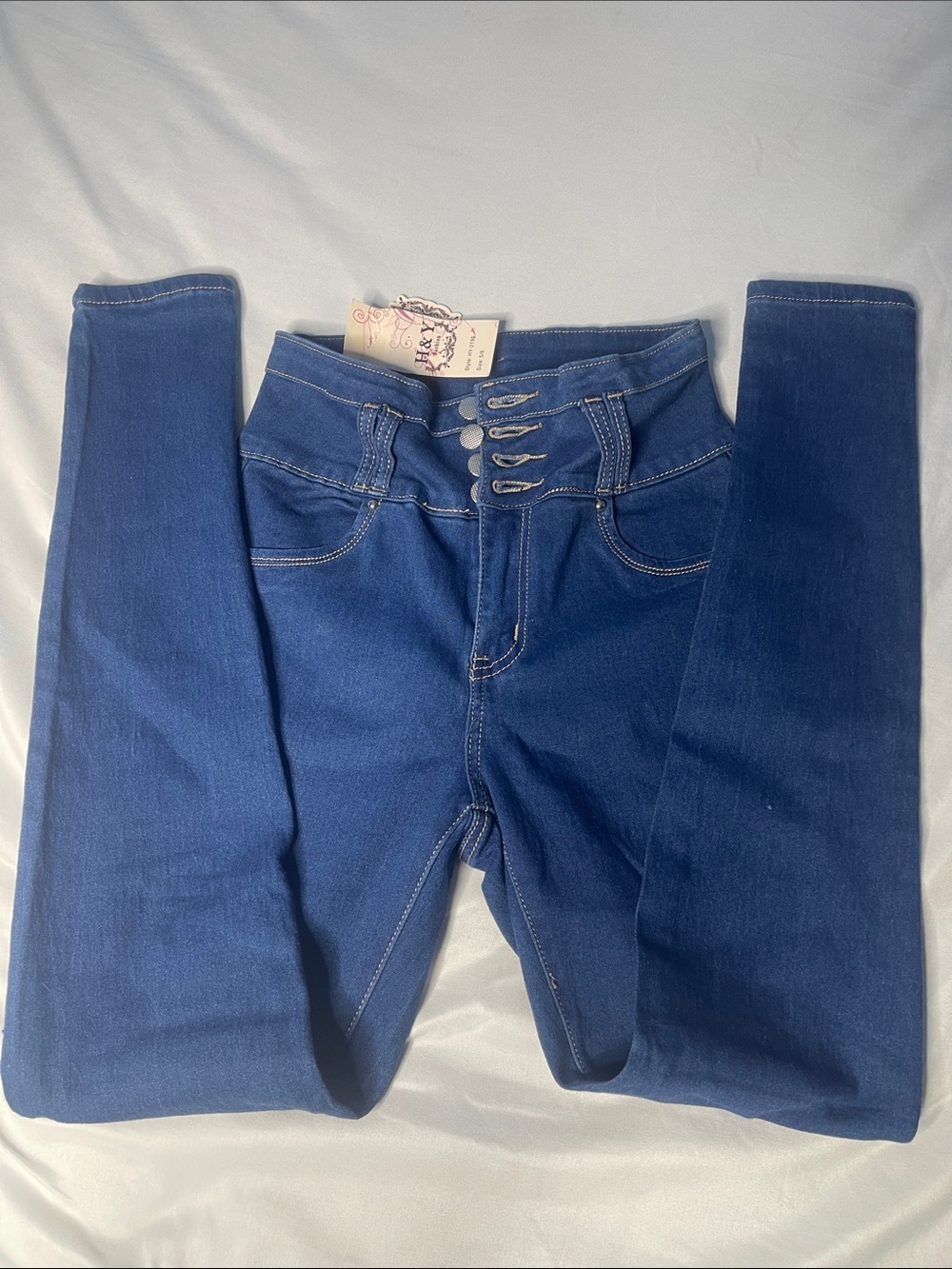 High-Waisted Blue Women’s Jeans with Button Detail